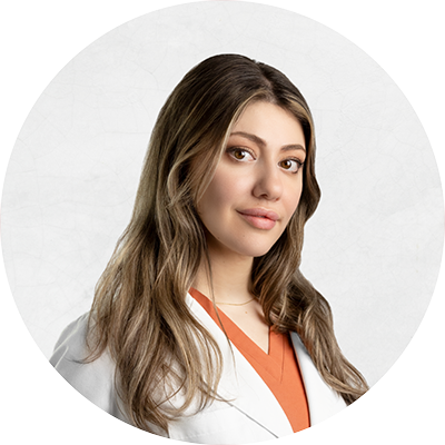 Sarah Gottfeld profile image in white collard top